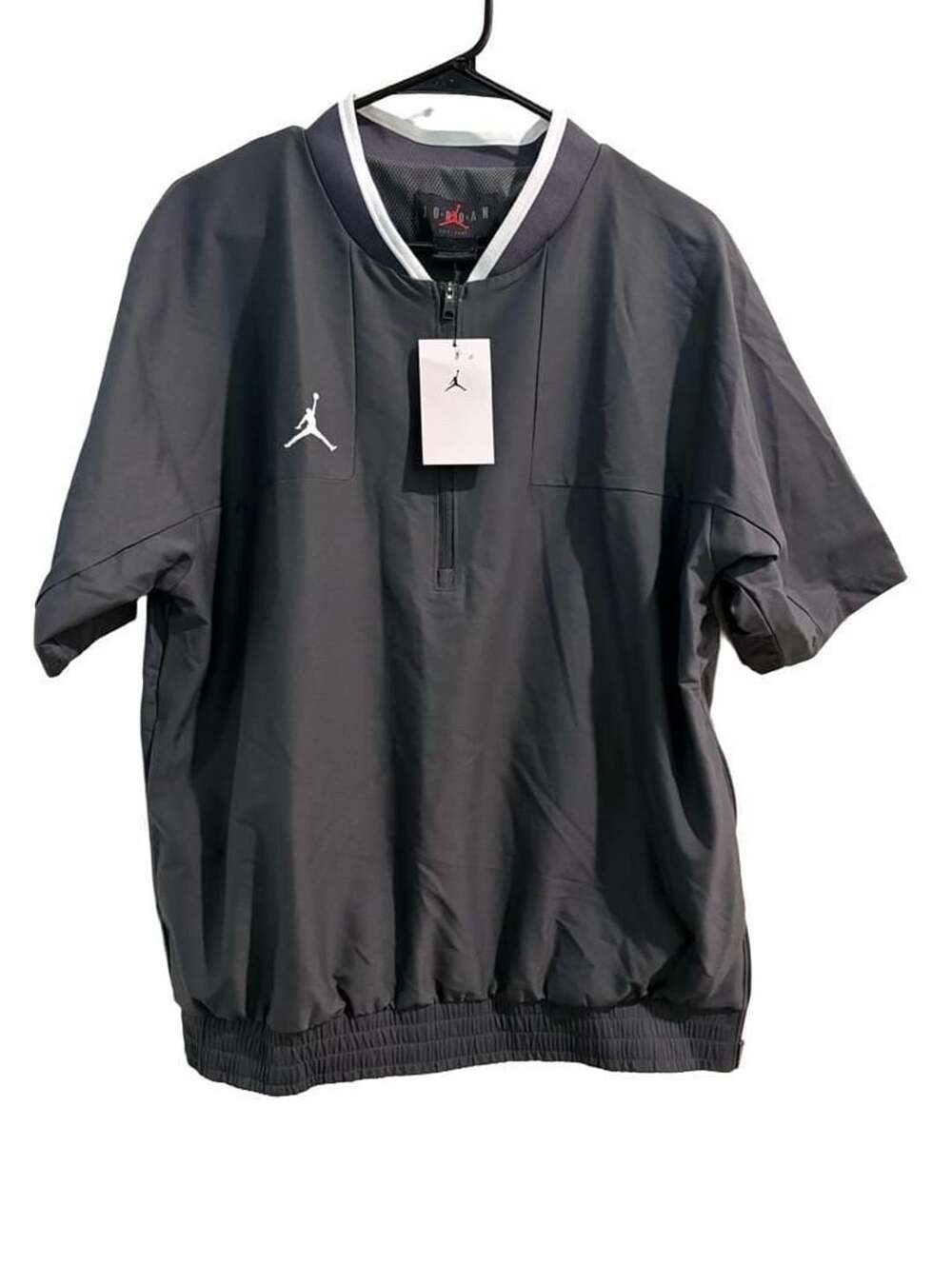 Jordan quarter zip wind breaker training shirt size large.